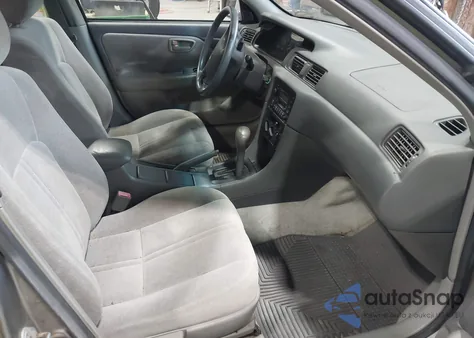 1999 Toyota Camry Le from USA, damaged, VIN 4T1BG22K3XU556347